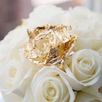 L'Atelier Rouge Florist added custom gold leaf roses to the blooms