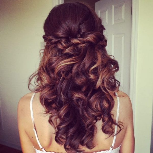 Long wedding hair with soft curls and twist