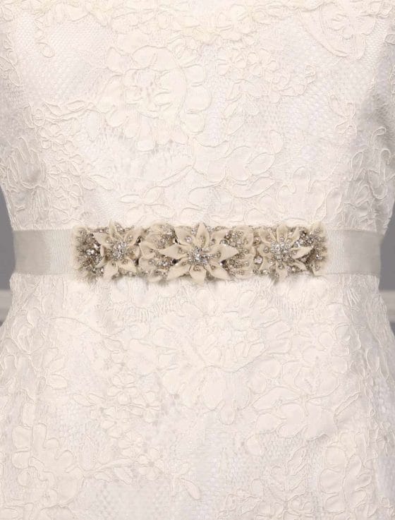 This diamond white B618 embellished bridal sash is Brand New! It is the perfect addition to any wedding gown, bridesmaid dress, or formal attire! The grosgrain ribbon sash is absolutely gorgeous in person! The beadwork and embellishments are a work of art!