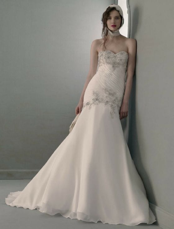This St. Pucchi Anastasia 705 wedding dress is absolutely amazing in person! The luxurious chiffon fabric has appliques of stunning beads and swarovski crystals. The gown has a strapless sweetheart neckline, a v-back, fit and flare wedding dress silhouette with an elegant sweep train.
