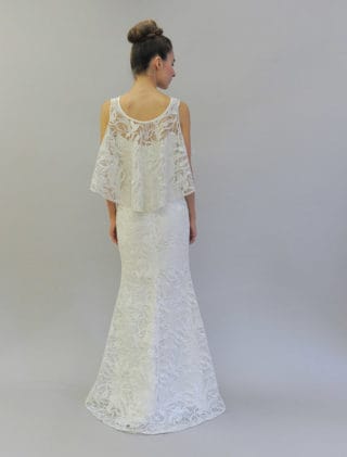 This beautiful Austin Scarlett Scarlett Collection Nadine E017 wedding dress is Brand New and has its hang tag attached!  The gown has two looks in one!  You can wear the removable cape or you can simply wear the spaghetti strap gown without the cape.  The trumpet silhouette flows into a short sweep train.  Gorgeous branch lace makes this Austin Scarlett wedding dress such a couture creation!