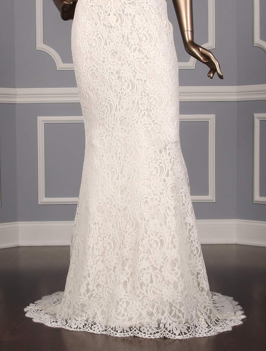 This beautiful Reem Acra Cheri 5624 wedding dress is Brand New!  The wedding gown is absolutely amazing in person!  It has cap sleeves, a natural waistline, a sweetheart neckline, sheer back & a sheath silhouette.  The train is chapel length.  The lace is luxurious with clear beads on the front and back bodice that add the perfect touch of sparkle!