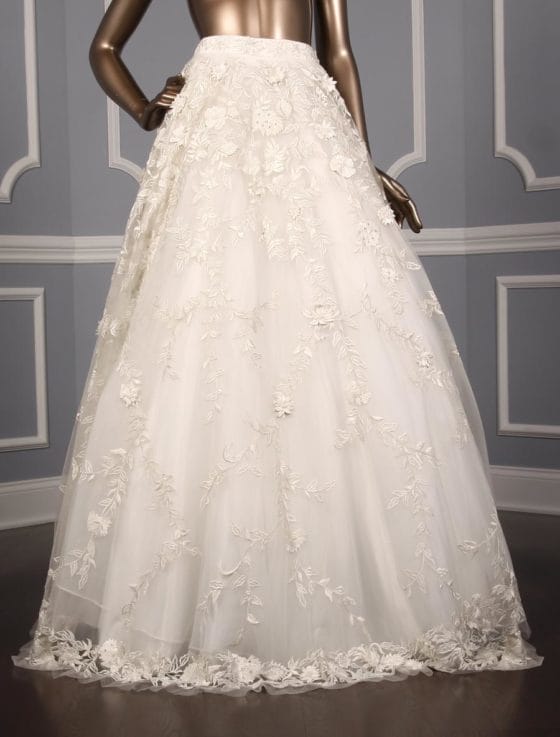 This incredible Carmen Marc Valvo Georgina C90060 wedding skirt is Brand New!  The skirt is made from luxurious hand beaded and embroidered tulle.  The floral and leaf pattern on this skirt is so elegant!  This Carmen Marc Valvo skirt has a ballgown silhouette and a chapel train.