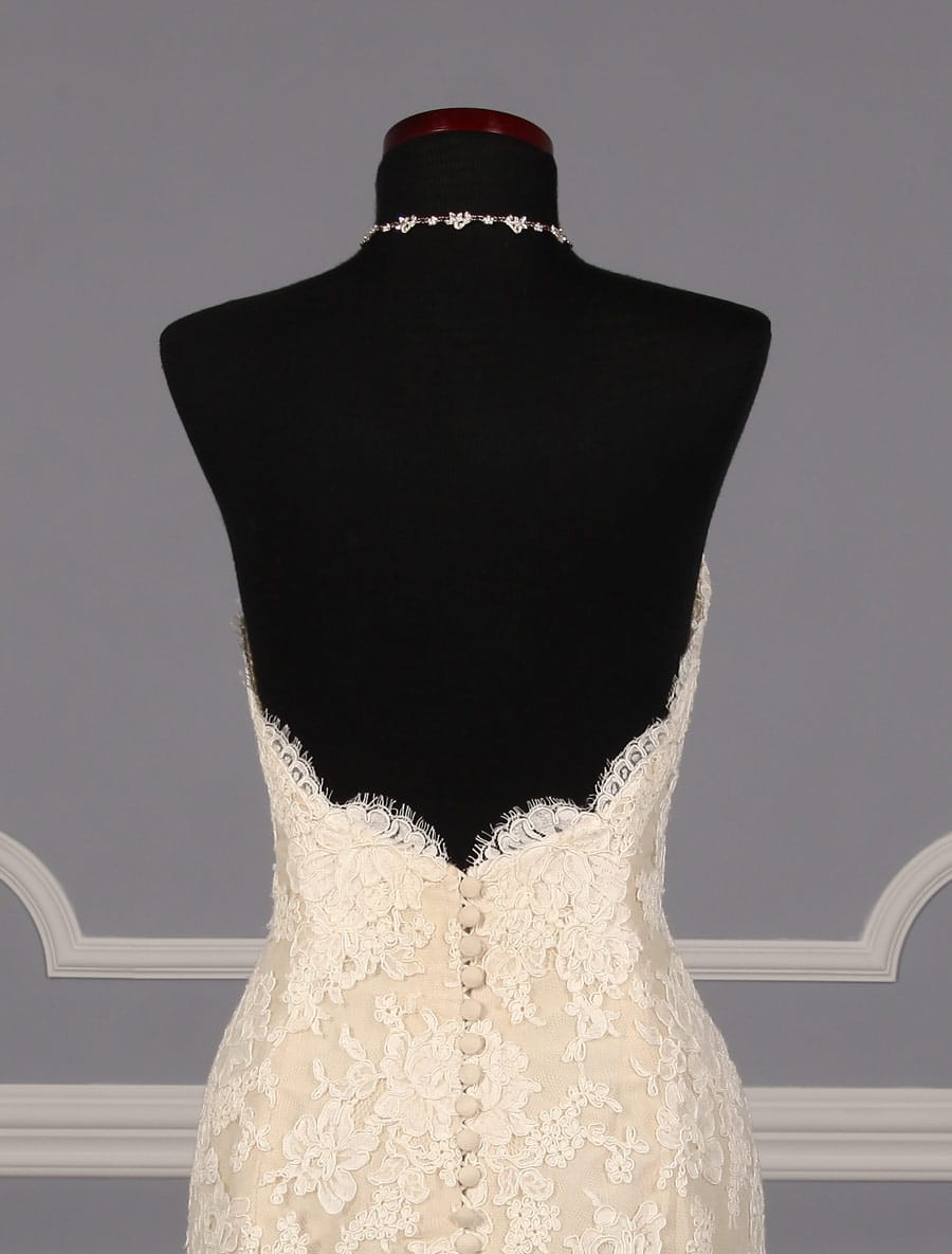 This beautiful Ines Di Santo Manye wedding dress is New!  The French Alencon Lace is absolutely amazing in person!  The lace is ivory and the taffeta lining is antique ivory, which is a warm ivory.  This Manye lace wedding gown is strapless with a sweetheart neckline, a trumpet / mermaid silhouette and a chapel train.  Such a timeless and classic style wedding gown! 