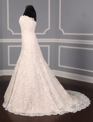 This lace Romona Keveza Legends L503 wedding dress is Brand New!  The gown has ivory re-embroidered lace and blush lining.  Such an elegant color combination!  This Romona Keveza strapless wedding gown has a scalloped neckline and hem, an a-line silhouette and a chapel train.