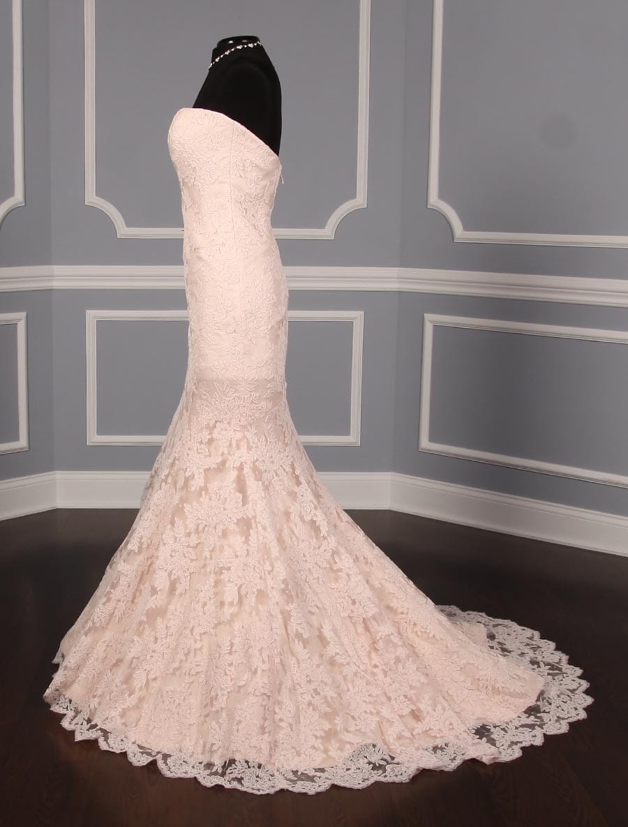 This exquisite, lace Romona Keveza Legends L7125 wedding dress is Brand New!  The blush color French Alencon lace is so pretty in person!  This strapless wedding gown has a sweetheart neckline and a trumpet silhouette that flows into a chapel train.