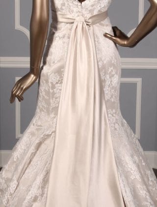 This Allure Bridal 9117 wedding dress is Brand New and has its hang tag attached!  The gown can be worn strapless, or if you like you can add the included spaghetti straps.  Either way, the gown is gorgeous and comfortable to wear for hours and hours.  The champagne lining shows through the ivory lace giving the Allure wedding gown a soft touch of color.  This wedding dress is strapless with a luxurious champagne satin sash at the waist, a trumpet silhouette and a chapel train.  If you prefer, the champagne sash can be removed.