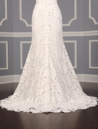 This Isabelle Armstrong Georgia X wedding dress is Brand New!  The gown is made from luxurious off white (light ivory) lace.  It has a sheer illusion halter neck with a low back, trumpet silhouette and a sweep train.  This Isabelle Armstrong wedding gown is extremely elegant and perfect for any type of wedding venue.