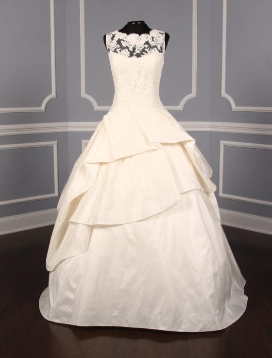 This Kenneth Pool Ina K514 wedding dress is in excellent, ready to wear condition!  The ivory French Alencon lace and silk taffeta fabrics are gorgeous in person.  The sleeveless wedding gown has a sheer bodice, v-back, dropped waist and a ballgown silhouette.  What a wonderful, comfortable gown to dance the night away!
