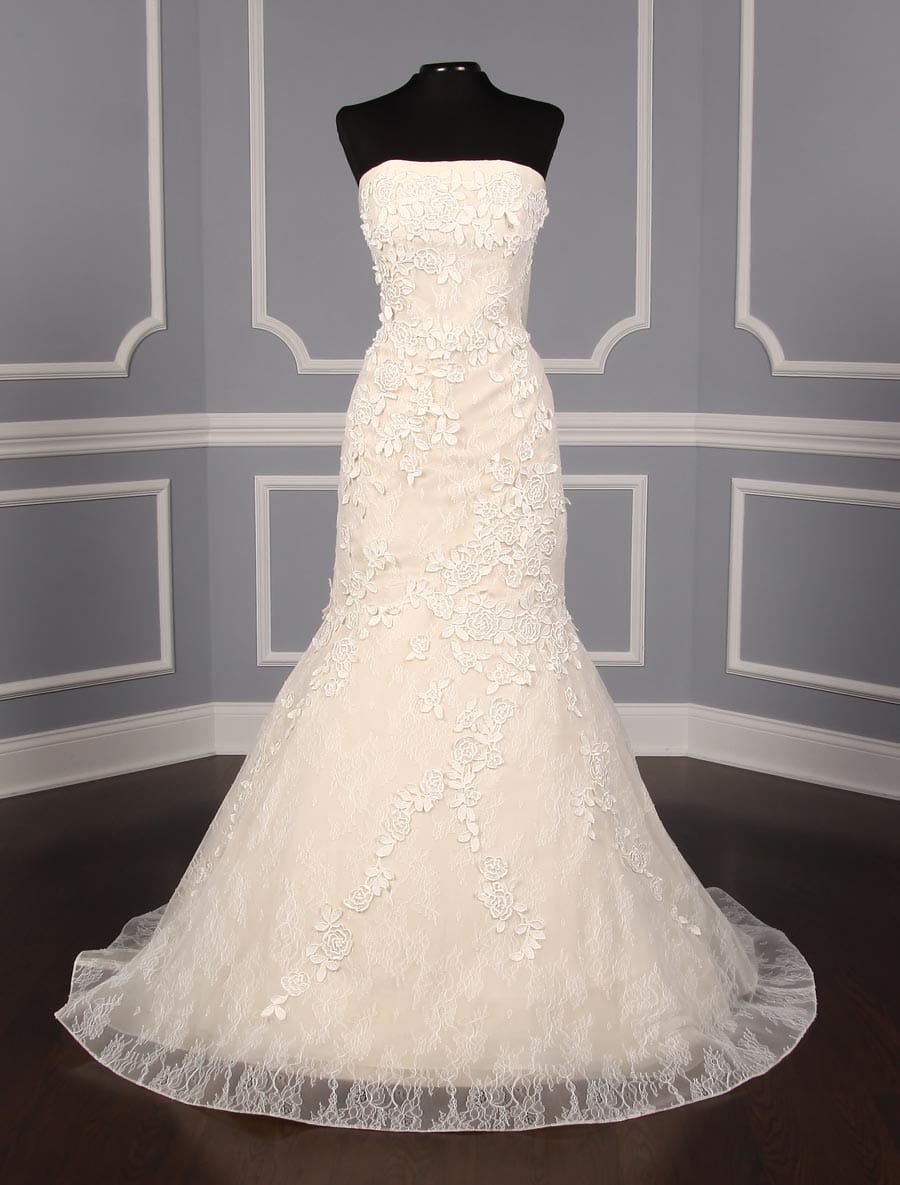 This Liancarlo 6891 wedding dress is Brand New!  The gown is made from incredible Chantilly lace with 3-D Guipure lace detail.  So gorgeous!!  The back of this strapless gown has a bandeau design with a keyhole cut out.  It is ivory/cream and will flatter many skin tones.  This gown is perfect for any type of wedding venue!  This Liancarlo lace wedding dress has a trumpet silhouette with a sweep train.