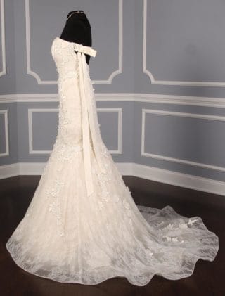 This Liancarlo 6891 wedding dress is Brand New!  The gown is made from incredible Chantilly lace with 3-D Guipure lace detail.  So gorgeous!!  The back of this strapless gown has a bandeau design with a keyhole cut out.  It is ivory/cream and will flatter many skin tones.  This gown is perfect for any type of wedding venue!  This Liancarlo lace wedding dress has a trumpet silhouette with a sweep train.