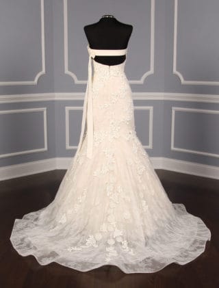 This Liancarlo 6891 wedding dress is Brand New!  The gown is made from incredible Chantilly lace with 3-D Guipure lace detail.  So gorgeous!!  The back of this strapless gown has a bandeau design with a keyhole cut out.  It is ivory/cream and will flatter many skin tones.  This gown is perfect for any type of wedding venue!  This Liancarlo lace wedding dress has a trumpet silhouette with a sweep train.