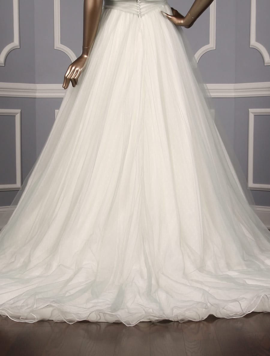 This Sophia Tolli Y11550 wedding dress is Brand New and has its Sophia Tolli hang tag attached!  The gown is incredible in person!  It is made from a misty gray color tulle with a dotted swiss tulle underlay.  So gorgeous and unique!  This ballgown wedding gown is sleeveless with a sweetheart neckline and a chapel train.  You will feel like a princess when you walk down the aisle in this stunning Sophia Tolli wedding dress.