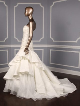 This David Tutera 115230 wedding dress is Brand New and has its David Tutera hang tag attached! The gown is made from beautiful embellished lace and organza. This lace wedding dress is strapless with a sweetheart neckline, a fit and flare silhouette and a chapel train. You will look amazing as you walk down the aisle in this gorgeous David Tutera wedding gown!